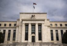 Mercados globales caen tras giro cauteloso de la Fed en medio del alza del petróleo