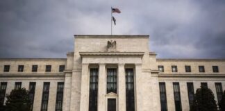 Mercados globales caen tras giro cauteloso de la Fed en medio del alza del petróleo