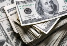 Dólar cae a $908 y alcanza mínimos ante avance del cobre