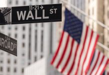 Wall Street sube impulsado por menor inflación y auge de la IA