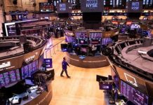 Wall Street resiste pese a la cautela de la Fed y la tensión comercial