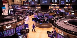 Wall Street resiste pese a la cautela de la Fed y la tensión comercial